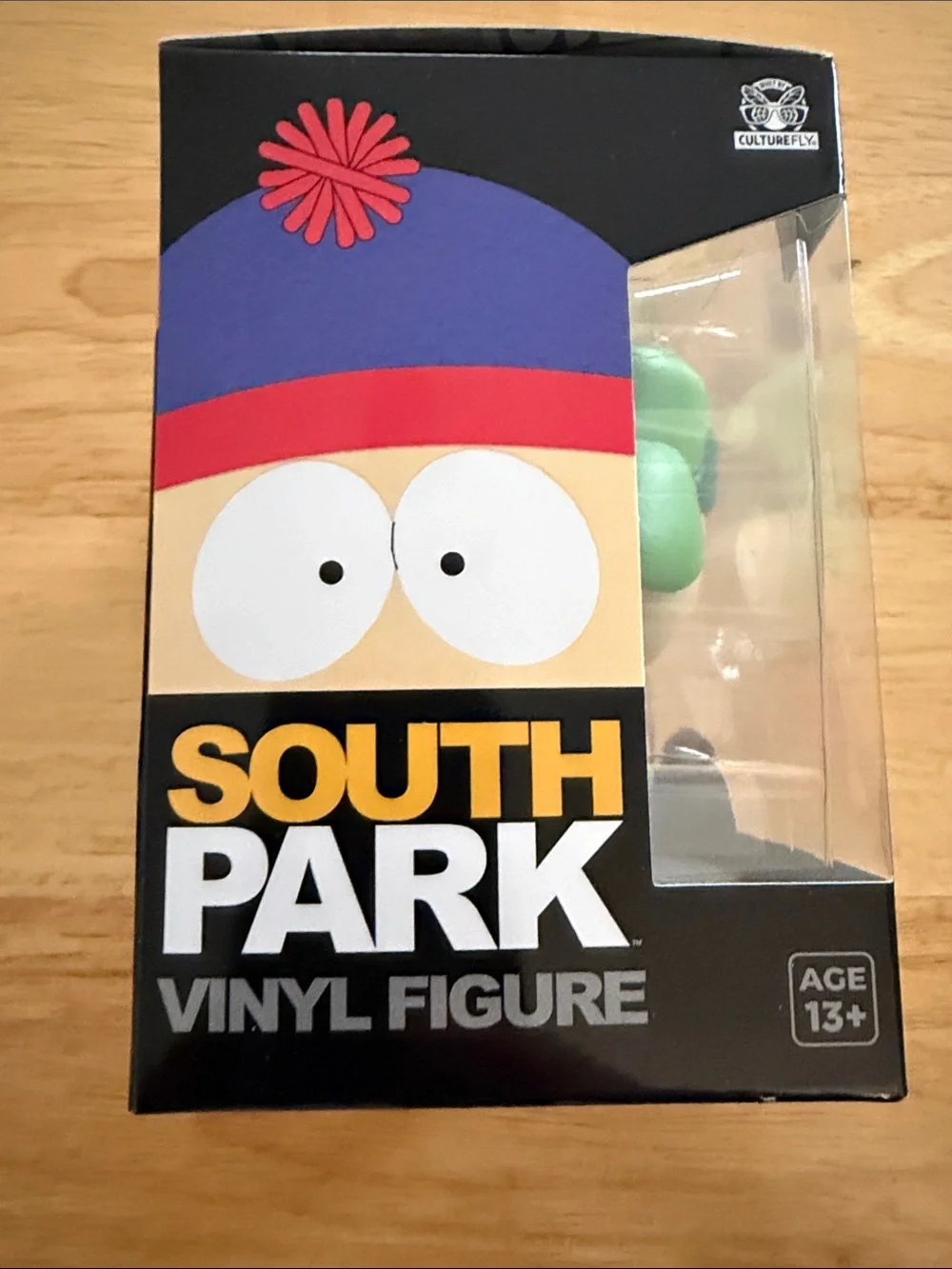 Kyle Vinyl Figure - Green Hat & Orange Jacket